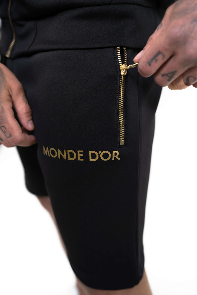 mens shorts black and gold